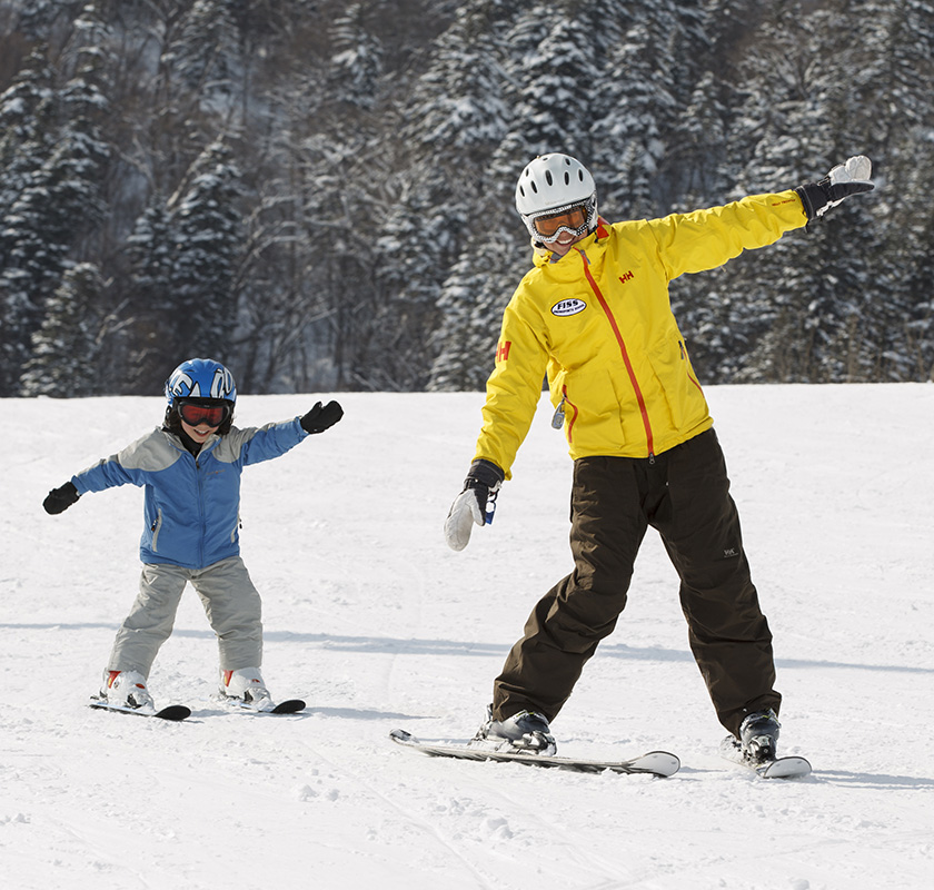 Picture of a child enjoying a safe, fun ski lesson