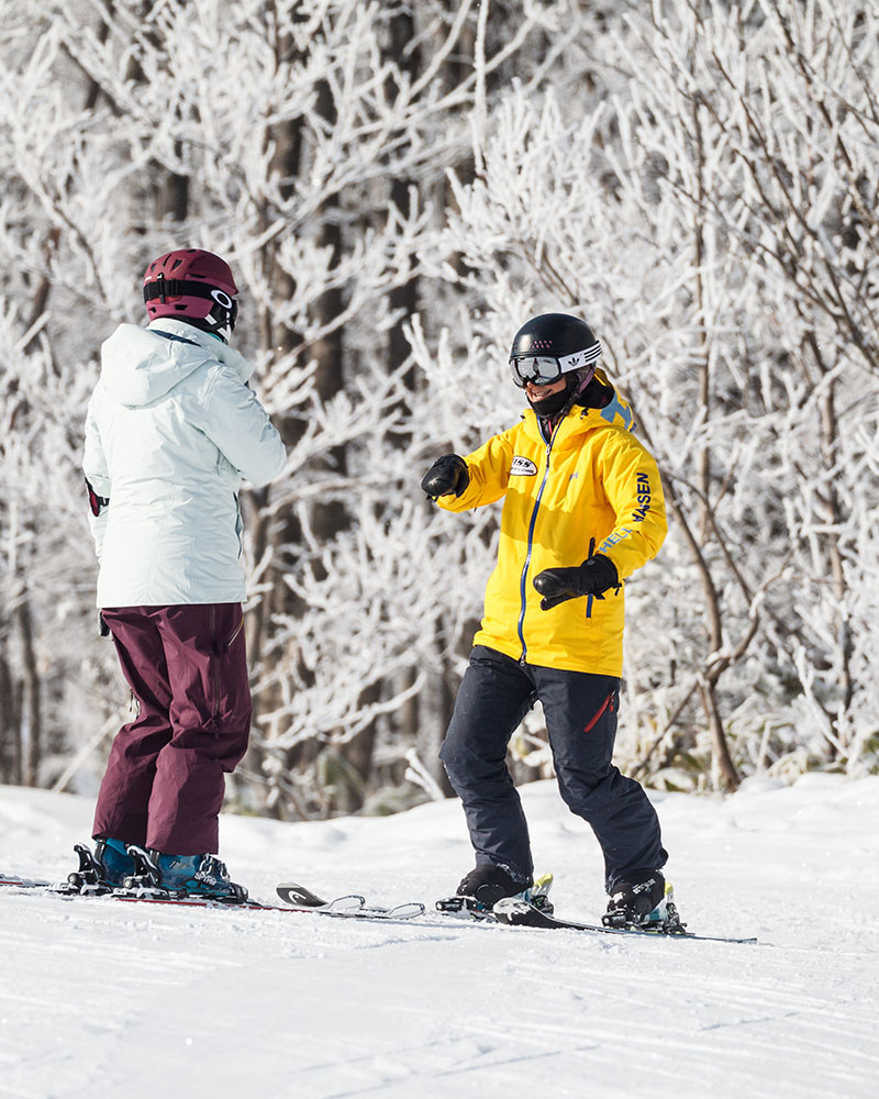Picture of snowboard instructor in deep powder snow